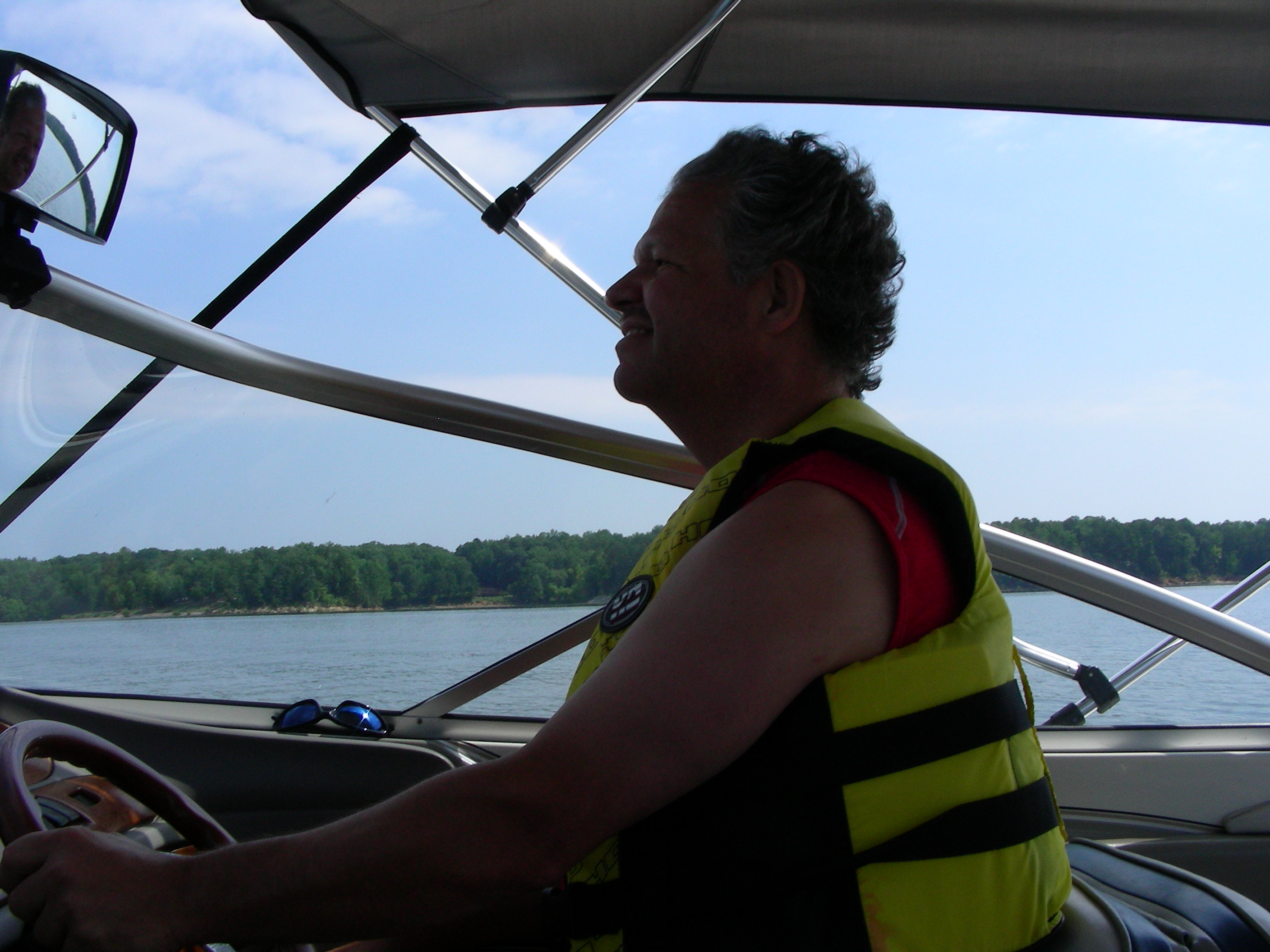 ./2010/Kerr Lake/Luis boating w guys 0008.JPG